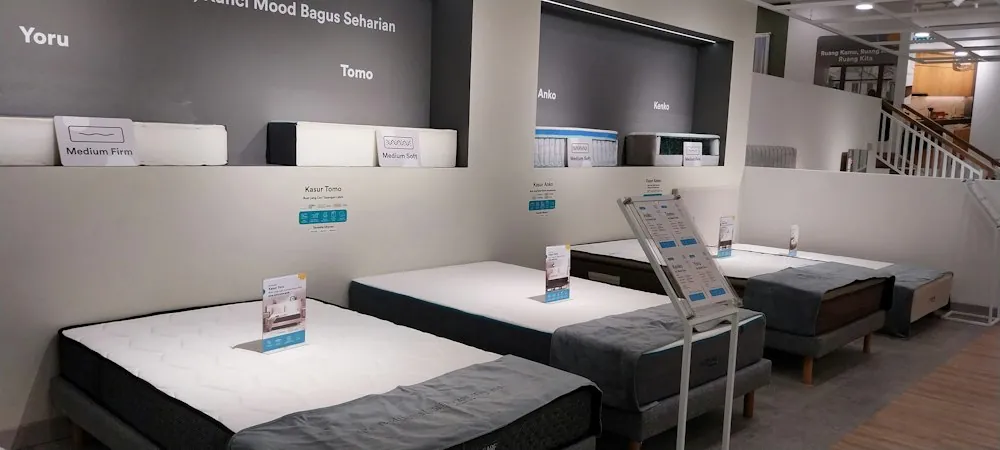 Rows of mattresses being compared side by side